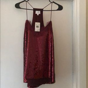 Cami NY breaks new with tag still attached